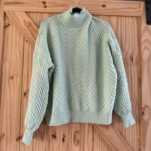 Light green sweater
